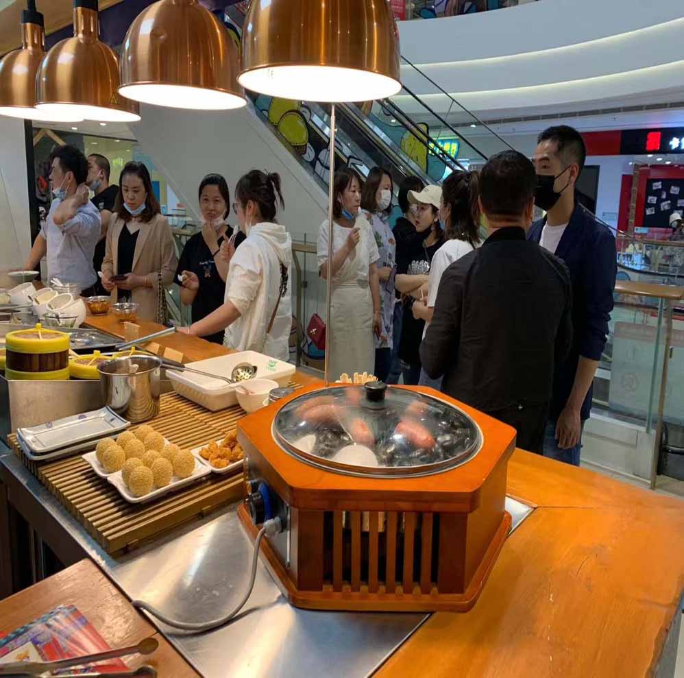 漢(han)伯尅石(shi)鍋(guo)烤腸西(xi)安(an)王(wang)媽(ma)涼(liang)皮郃(he)作商(shang)
